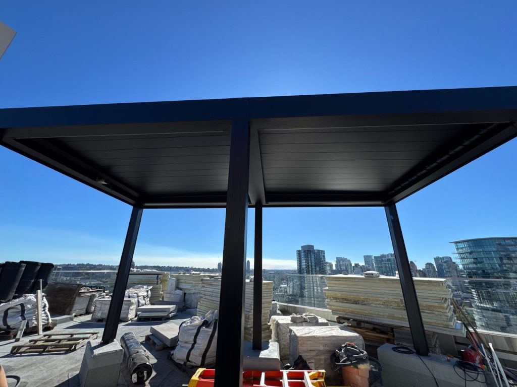 Shade structure for rooftop landscape patio comfort in full sun exposure